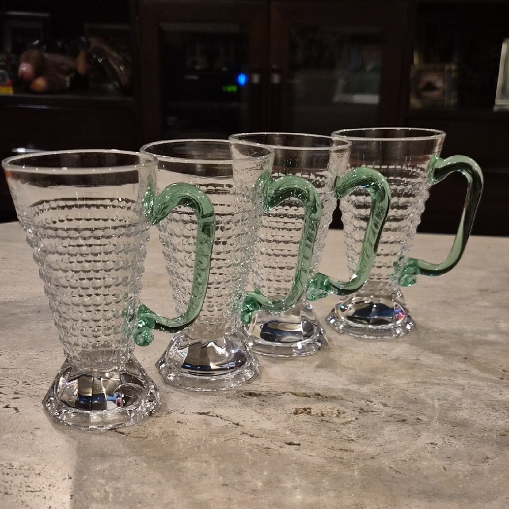 Elegant Glass Mugs with Green Handles